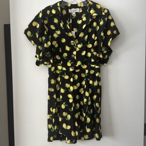 Michael Kors collection romper. Lemon pattern with black background. Silk size 6